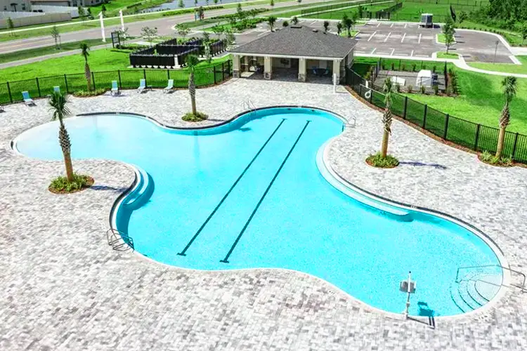 Lakeland FL community pool with swim lanes used by Poolskool USA for private swim lessons and stroke development training